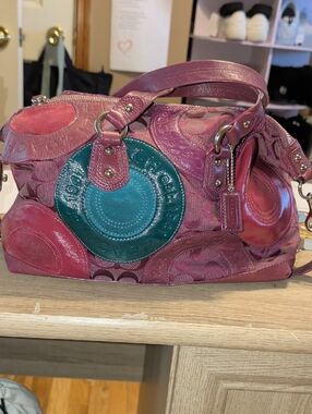 Coach Pink Satchel with Teal Medallion Accent